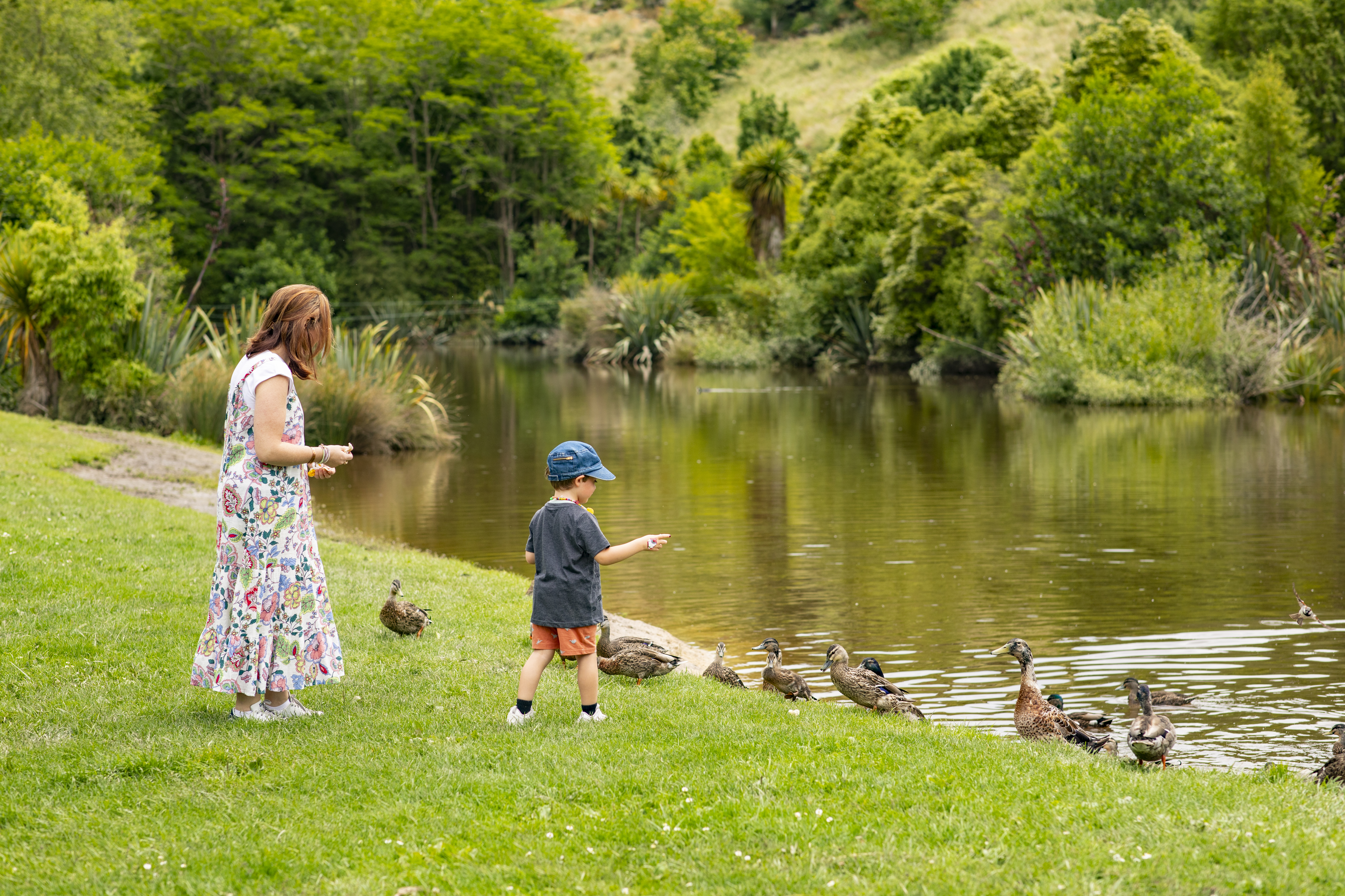 Woman and boy at Centennial Park duck pond