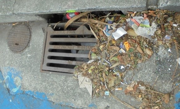 Storm drain filled iwth Rubbish